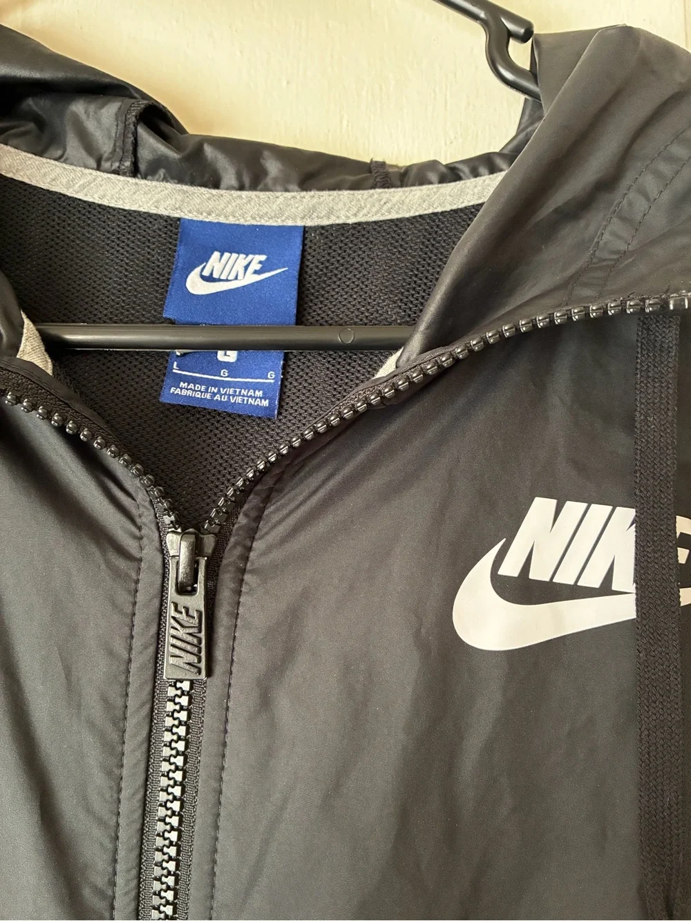 Nike Black Jacket with White Swoosh Logo